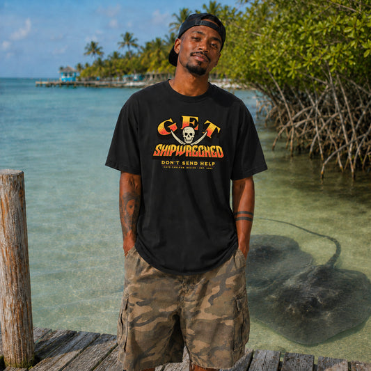 Model wearing the black Get Shipwrecked Rocker Tee with a pirate skull and crossed cutlasses